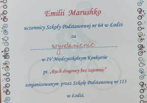 Dyplom dla Emilii Marusho za wyróżnienie w konkursie "Ruch drogowy bez tajemnic"