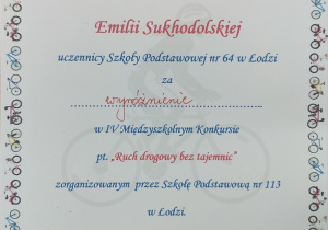Dyplom dla Emilii Sukhodolskiej za wyróżnienie w konkursie "Ruch drogowy bez tajemnic"