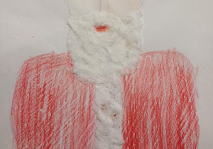 Praca wykonana techniką rysunkową i wyklejaną (pastele, wata) – portret Mikołaja
