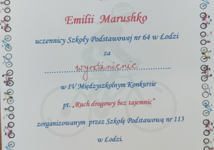 Dyplom dla Emilii Marusho za wyróżnienie w konkursie "Ruch drogowy bez tajemnic"