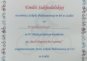 Dyplom dla Emilii Sukhodolskiej za wyróżnienie w konkursie "Ruch drogowy bez tajemnic"