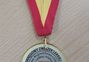 Medal zdobyty w Halowych Mistrzostwach Młodzików Województwa Łódzkiego w Lekkiej Atletyce.