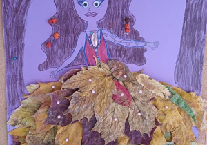 Praca indywidualna uczestnika konkursu "Pani Jesień liściem malowana" (portret rysowany i ozdobiony liśćmi)