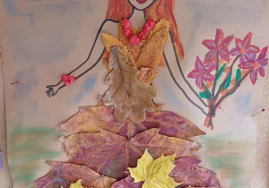 Praca indywidualna uczestnika konkursu "Pani Jesień liściem malowana" (portret rysowany i ozdobiony liśćmi)